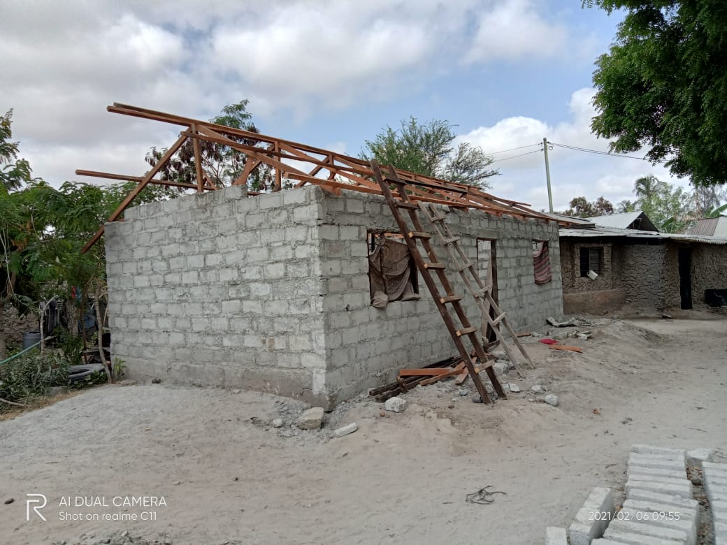 Touching life James Mwadzuya House